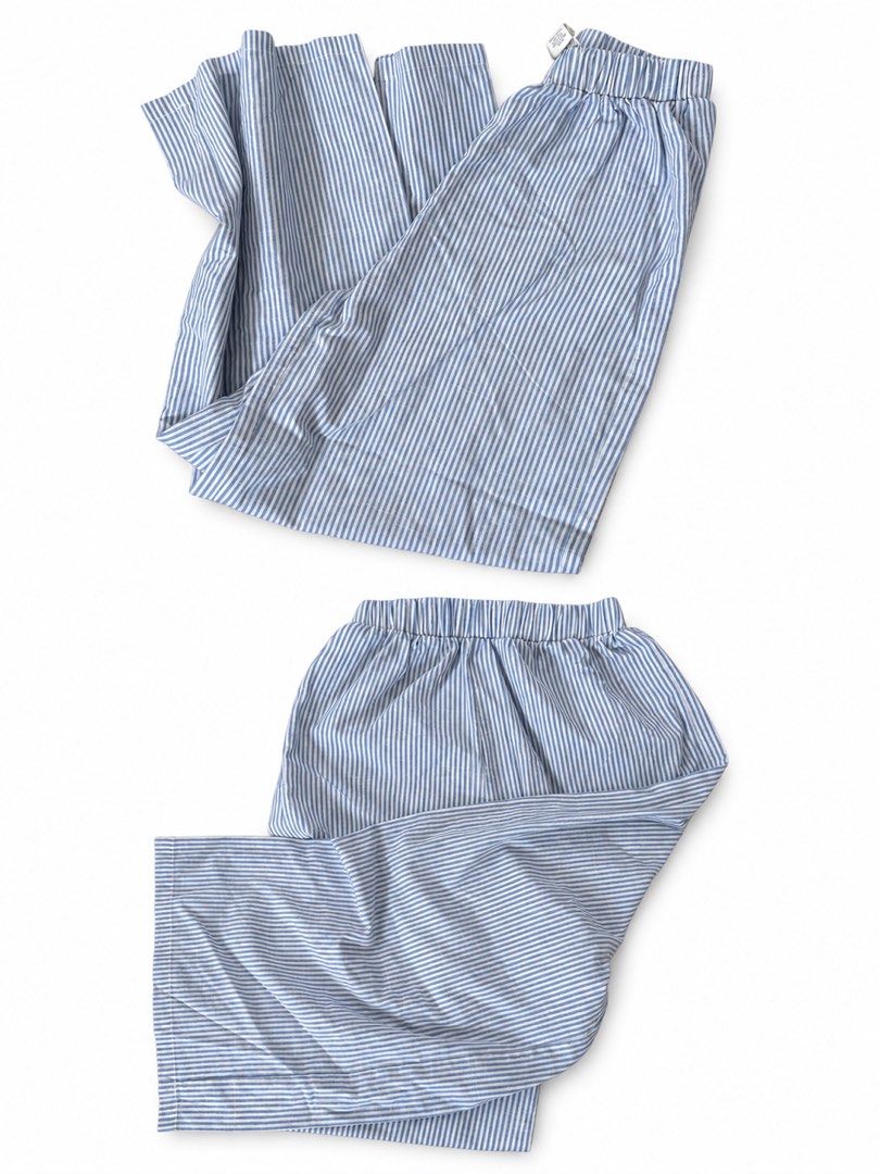 Blue and White Striped Lounge Pants (Category: Other Bottoms) located in Manila. Submitted by betterdaysstudio (Listing ID 1460542622, Image 1). Description: - Classic blue and white stripe pattern - Comfortable elastic waistband for a relaxed fit - Made from soft, easy-to-wear fabric - Ideal for lounging at home or for sleepwear.