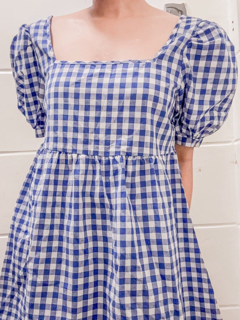 Blue Gingham Square Neck Puff Sleeve Mini Dress (Category: Dresses) located in Manila. Submitted by jemmmandes (Listing ID 1460566369, Image 2). Description: - Adorable blue and white gingham mini dress - Fits Med - model size: small body frame.