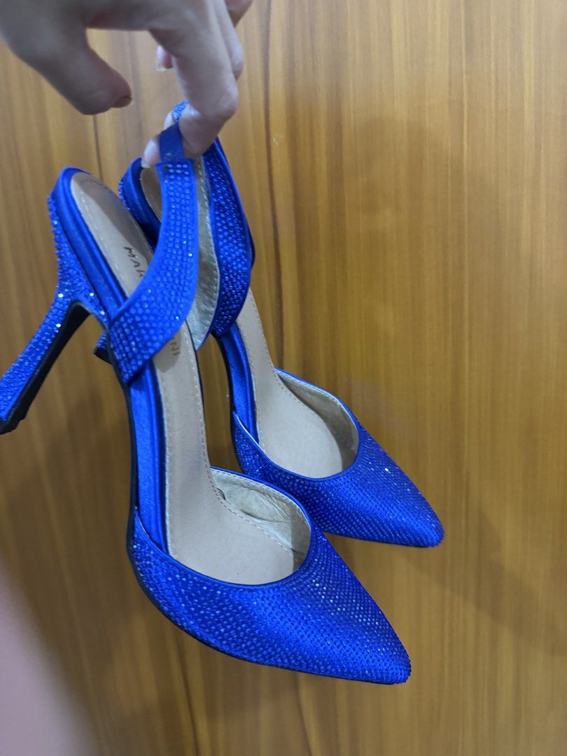 Blue Sparkly Slingback Heels size 5 (Category: Heels) located in Makati City. Submitted by petite_preloved2 (Listing ID 1460601971, Image 1). Description: - Sparkly blue slingback heels - Pointed toe design - Secure ankle strap - Heel covered in matching blue sparkles - Perfect for parties or a night out - Size 35.