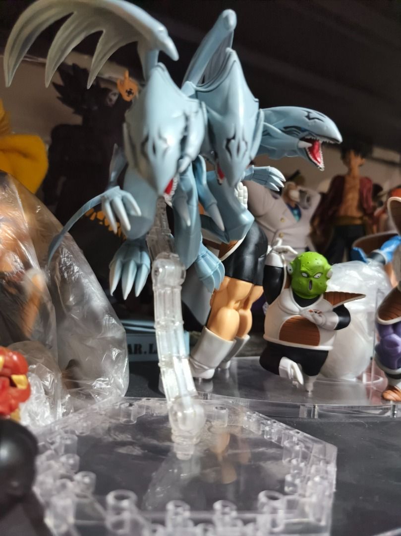 Blue-Eyes White Dragon Action Figure with Stand (Category: Figurines & Statues) located in San Leonardo. Submitted by burgossanleonardo.12345 (Listing ID 1460685367, Image 2). Description: - Detailed Blue-Eyes White Dragon action figure - Approximately 6 inches tall - Comes with a clear display stand (as pictured) - A must-have for any Yu-Gi-Oh! fan - Looks awesome!.