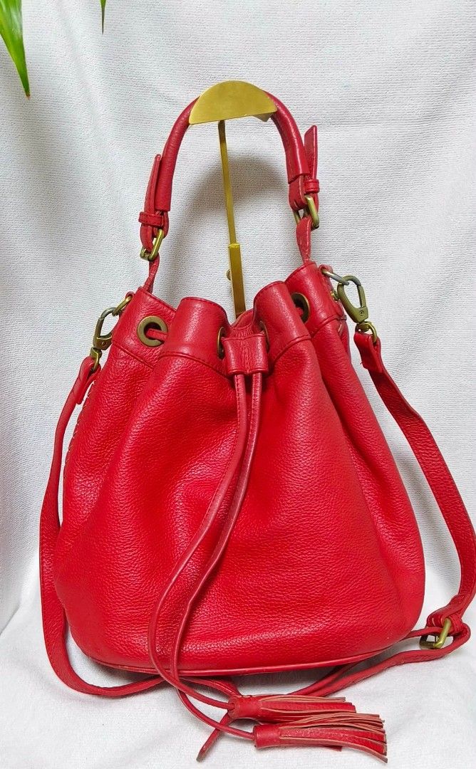 BODEN REAL LEATHER DRAWSTRING Two-way bucket bag (Category: Cross-body Bags) located in Baguio. Submitted by amagenbagsfashionshop (Listing ID 1460676924, Image 2). Description: Boden Real Leather Drawstring Two-Way Bucket bag This Boden bucket bag is crafted from genuine pebbled leather in a beautiful cherry red color, making it a standout accessory for any outfit. 👜 Details: • Genuine Pebbled Leather • Color: Cherry Red • Drawstring closure wi
