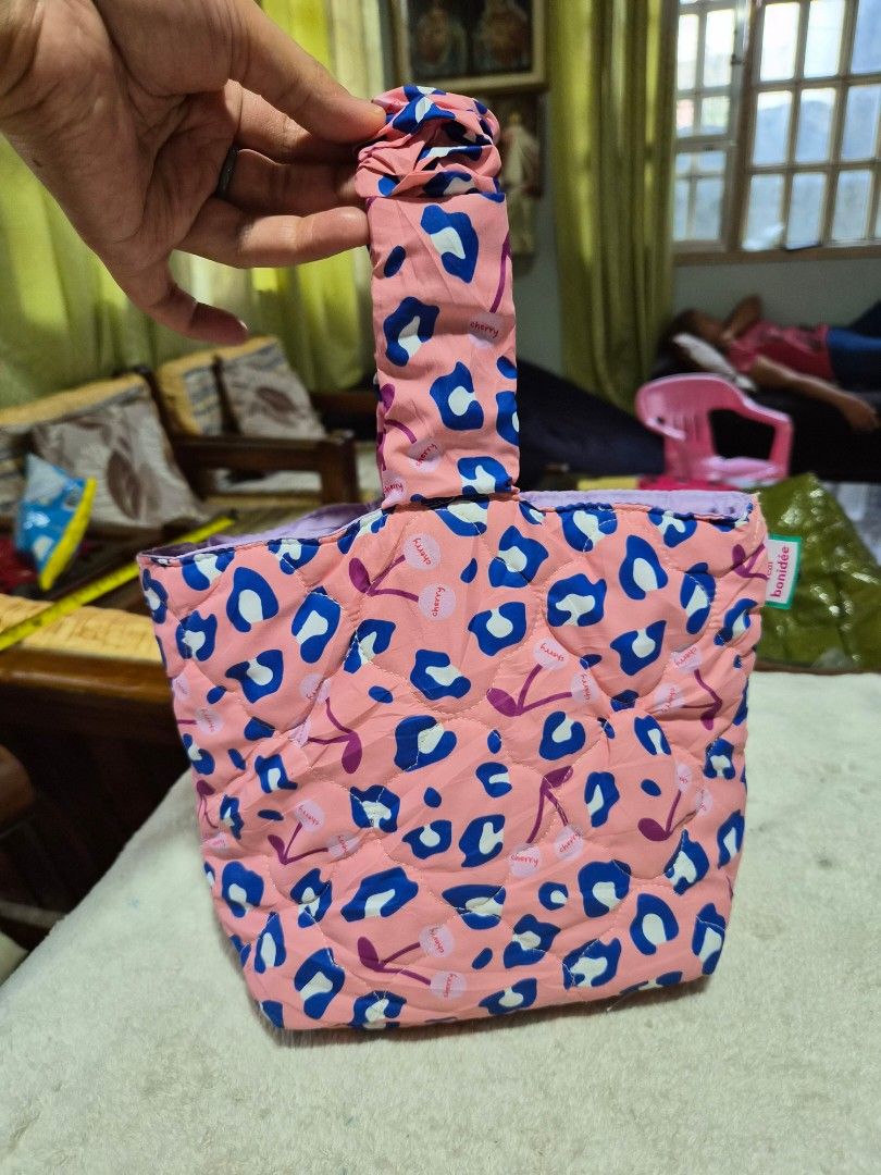 Bonidee Padded Pouch with Cherry and Leopard Print (Category: Purses & Pouches) located in Mandaue City. Submitted by chuchi152615 (Listing ID 1460629160, Image 1). Description: - Cute padded pouch from Bonidee - Features fun pink cherry and leopard print - Light purple lining with a small inner pocket - Includes a handle for easy carrying - Ideal for organizing small items.