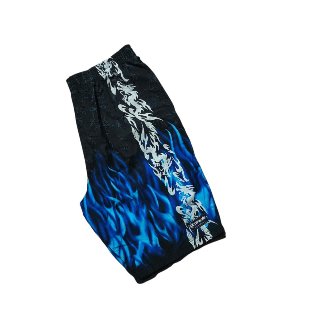 BOOT Airwalk Flame Dragon Print Board Shorts (Category: Swim Trunks & Board Shorts) located in Antipolo. Submitted by soon2byours_ (Listing ID 1460654928, Image 1). Description: Dimensions (laid flat): Width: 31" on tape measure (not stretched) Length: 22½" Hem: 10" [Cut tags] Flaws: graphic fading sa dragon & missing lace Color Rate: 9.5/10 Condition: ALMOST EXCELLENT COLOR MAY VARY DUE TO LIGHTING!.