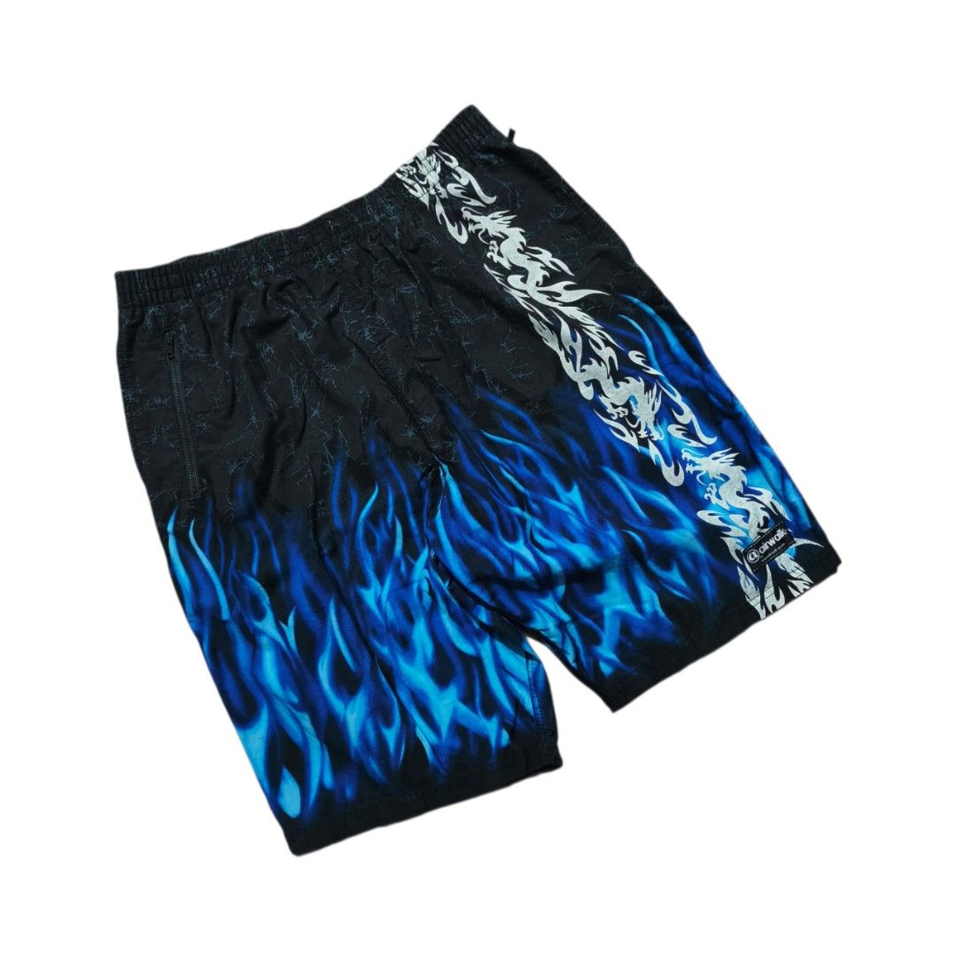 BOOT Airwalk Flame Dragon Print Board Shorts (Category: Swim Trunks & Board Shorts) located in Antipolo. Submitted by soon2byours_ (Listing ID 1460654928, Image 2). Description: Dimensions (laid flat): Width: 31" on tape measure (not stretched) Length: 22½" Hem: 10" [Cut tags] Flaws: graphic fading sa dragon & missing lace Color Rate: 9.5/10 Condition: ALMOST EXCELLENT COLOR MAY VARY DUE TO LIGHTING!.