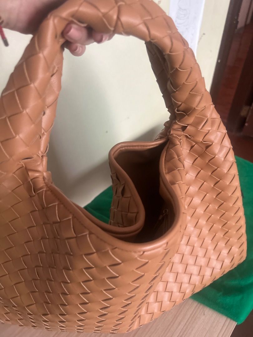 Bottega Veneta Pouch Clutch Bag (Category: Luxury Bags & Wallets) located in Cebu City. Submitted by serene_simplicity (Listing ID 1460535962, Image 2). Description: - “OGquality” Bottega Veneta pouch clutch - Made from soft, buttery leather - Features the iconic Intrecciato weave - Comes with original dust bag - Perfect for evening events or as a statement accessory.