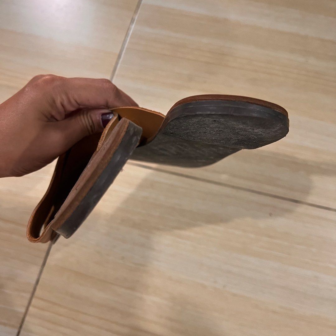 Brown leather slippers / slip ons (Category: Flats & Sandals) located in Pasay City. Submitted by curatedclothing (Listing ID 1460712983, Image 2). Description: Genuine leather S8 / 25cm insole Worn around 5x.