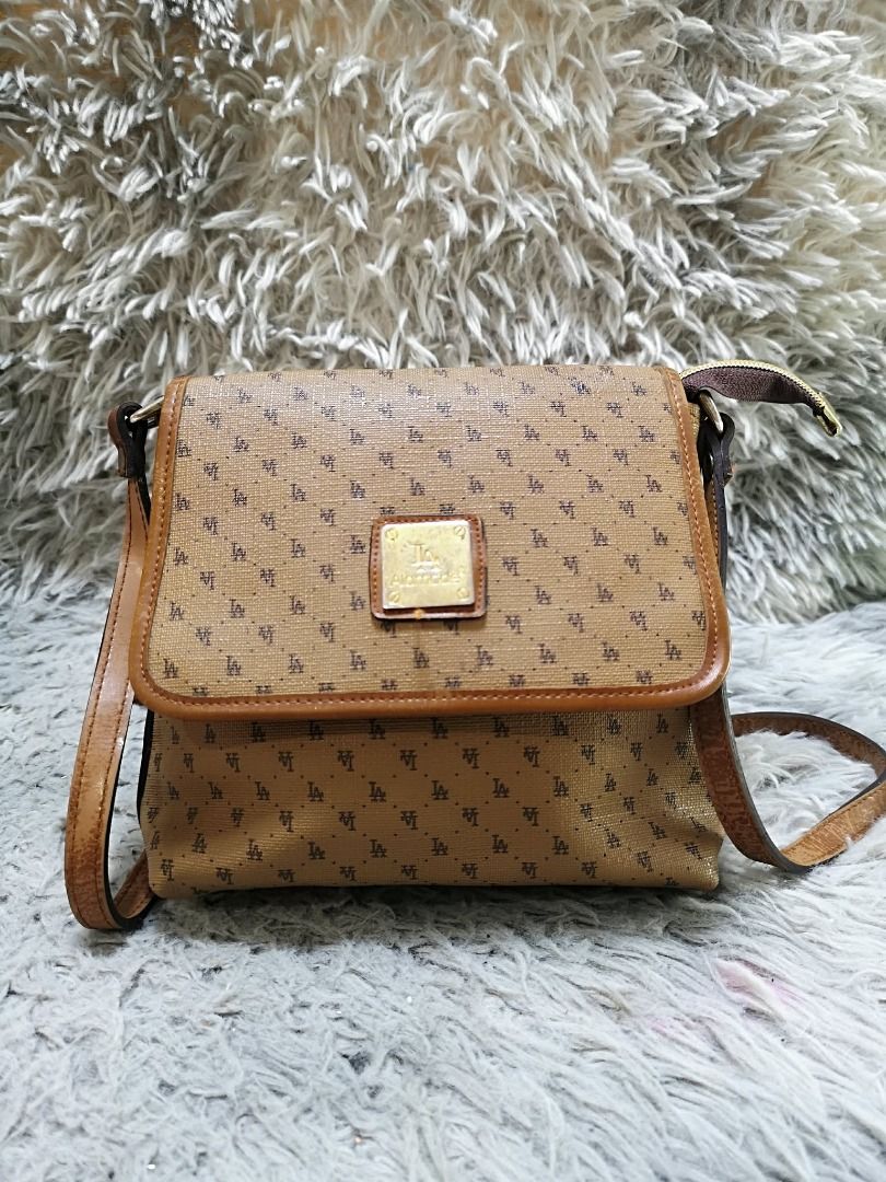 Brown Monogram Leather Thin Strap Crossbody Bag (Category: Cross-body Bags) located in Santa Cruz. Submitted by jmy_surplus.2 (Listing ID 1460527337, Image 1). Description: Size ; L - 7.5 W - 9 Color ; Brown Type ; Crossbody Bag Brand ; No brand Material ; Leather Style ; Brown Leather Crossbody Bag LR 173 JMY 5 Batch #218.