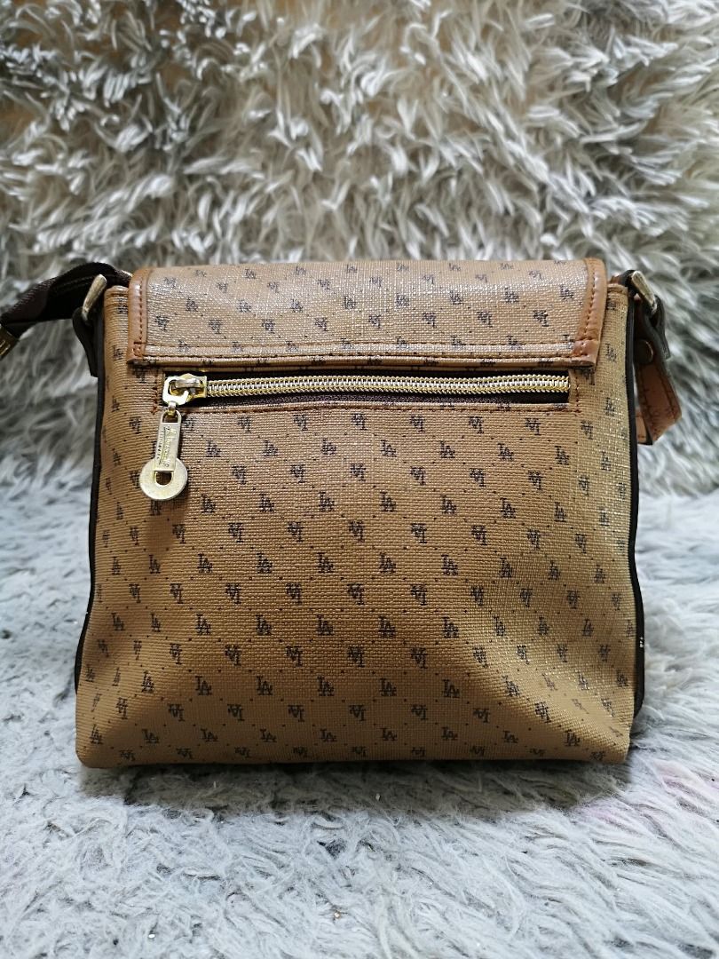 Brown Monogram Leather Thin Strap Crossbody Bag (Category: Cross-body Bags) located in Santa Cruz. Submitted by jmy_surplus.2 (Listing ID 1460527337, Image 2). Description: Size ; L - 7.5 W - 9 Color ; Brown Type ; Crossbody Bag Brand ; No brand Material ; Leather Style ; Brown Leather Crossbody Bag LR 173 JMY 5 Batch #218.