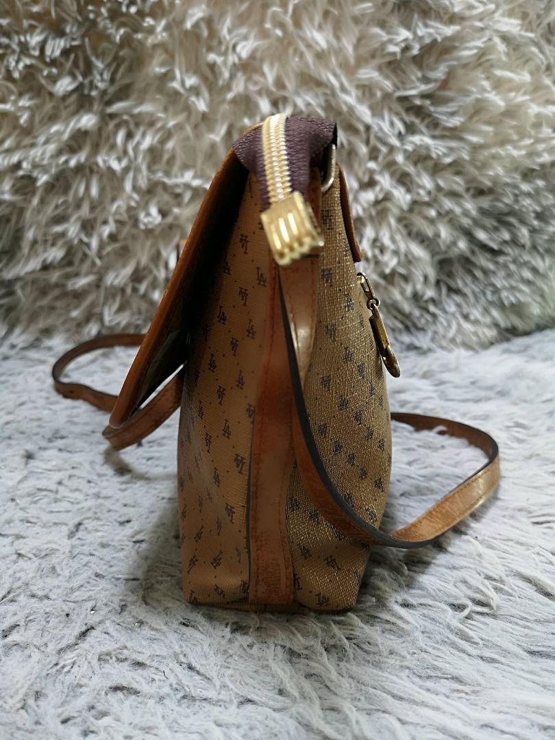 Brown Monogram Leather Thin Strap Crossbody Bag (Category: Cross-body Bags) located in Santa Cruz. Submitted by jmy_surplus.2 (Listing ID 1460527337, Image 3). Description: Size ; L - 7.5 W - 9 Color ; Brown Type ; Crossbody Bag Brand ; No brand Material ; Leather Style ; Brown Leather Crossbody Bag LR 173 JMY 5 Batch #218.