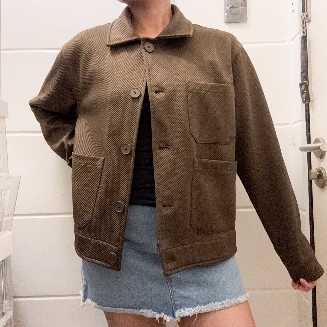 Brown Textured Button-Up Jacket (Category: Coats, Jackets and Outerwear) located in Manila. Submitted by jemmmandes (Listing ID 1460568146, Image 1). Description: - Mens Jacket / unisex - Model Size: Small Body Frame.
