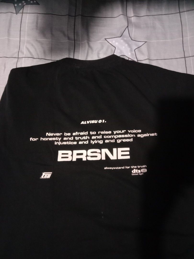 BRSNE ALVISUOI Graphic T-Shirt (Category: Tshirts & Polo Shirts ) located in Manila. Submitted by chieezz (Listing ID 1460662014, Image 2). Description: - Black graphic t-shirt - Features front and back print with text and graphics - "Never be afraid to raise your voice for honesty and truth and compassion against injustice and lying and greed." - High-quality material - Ideal for casual wear.