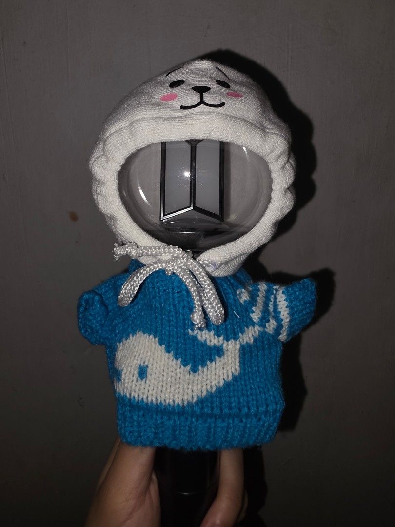 BTS Army Bomb Lightstick Cover - Jin Inspired (Category: K-Wave Merchandise) located in Manila. Submitted by _sj1204 (Listing ID 1460550075, Image 1). Description: - Adorable RJ character design for your BTS Army Bomb lightstick. - Hand-knitted blue whale sweater and RJ hood for Jin biased fans. - Protects your lightstick from scratches and damage. - Adds a special, personalized touch to your lightstick. - Features a convenient drawstring closure
