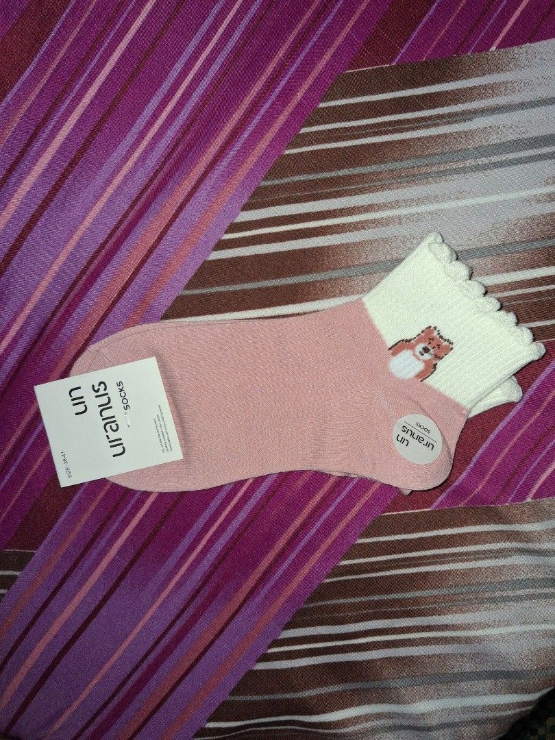 Bundle Ankle Socks (Category: Socks) located in Baguio. Submitted by arowarwai (Listing ID 1460663967, Image 2). Description: - Bundle of 3 pairs of ankle socks - Cute bear print with pink heel - Playful fox design on pink base - Blue with colorful polka dots - Low-cut and comfortable for everyday wear - Adds a fun touch to any outfit.