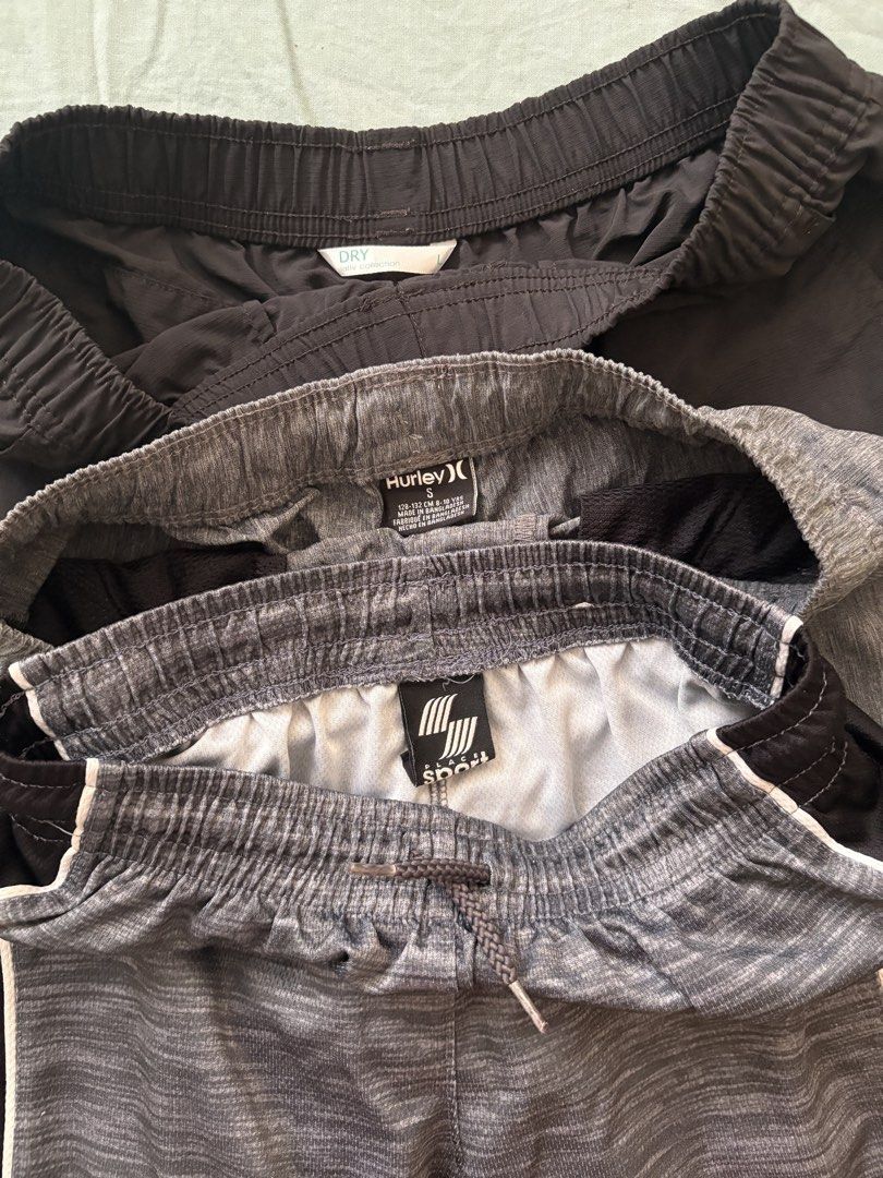 Bundle of 3 BOYS Athletic Shorts (Category: Babies & Kids Fashion) located in Manila. Submitted by anabri (Listing ID 1460556867, Image 2). Description: - Bundle of 3 boys’ shorts - Includes: 1 black pair, 1 grey marl pair with black/white accents, 1 plain grey marl pair - can ask for more photos, shorts are in good condition .