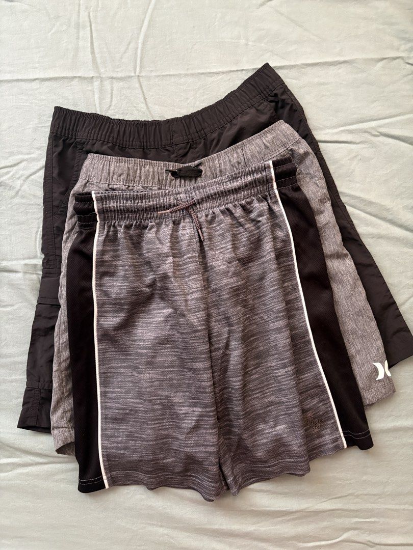 Bundle of 3 BOYS Athletic Shorts (Category: Babies & Kids Fashion) located in Manila. Submitted by anabri (Listing ID 1460556867, Image 1). Description: - Bundle of 3 boys’ shorts - Includes: 1 black pair, 1 grey marl pair with black/white accents, 1 plain grey marl pair - can ask for more photos, shorts are in good condition .