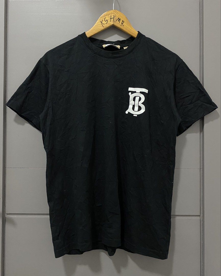 Burberry Black T-shirt with TB Monogram (Category: Tshirts & Polo Shirts ) located in Manila. Submitted by castromerb32733 (Listing ID 1460665932, Image 1). Description: Burberry 19x26 Good condi need wash.