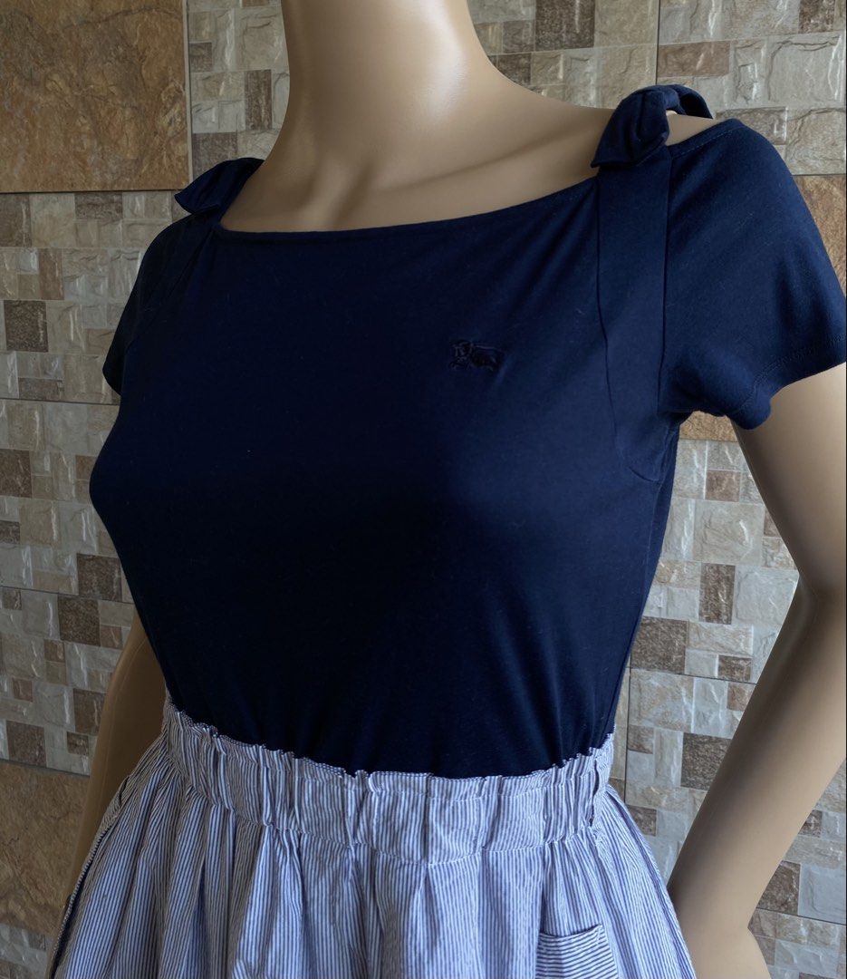BURBERRY BLUE LABEL - DRESS (Category: Dresses) located in Bacolod City. Submitted by timelessbyjosh (Listing ID 1460640545, Image 2). Description: BEST FOR CASUAL & Y2K OUTFITS SIZE : 36 ACTUAL COLOR : NAVY BLUE , BLUE & WHITE COLOR RATE : 10 OUT OF 10 CONDITION : NEAR NEW MATERIAL : TOP: COTTON 100 % BOTTOM: COTTON 91 % & POLYESTER 9 % LINING: POLYESTER MADE IN : JAPAN FLAWS : NONE DIMENSIONS LENGTH - 31. 5 WIDTH ( ARMPIT TO ARMPIT )- 14. 5 WAI