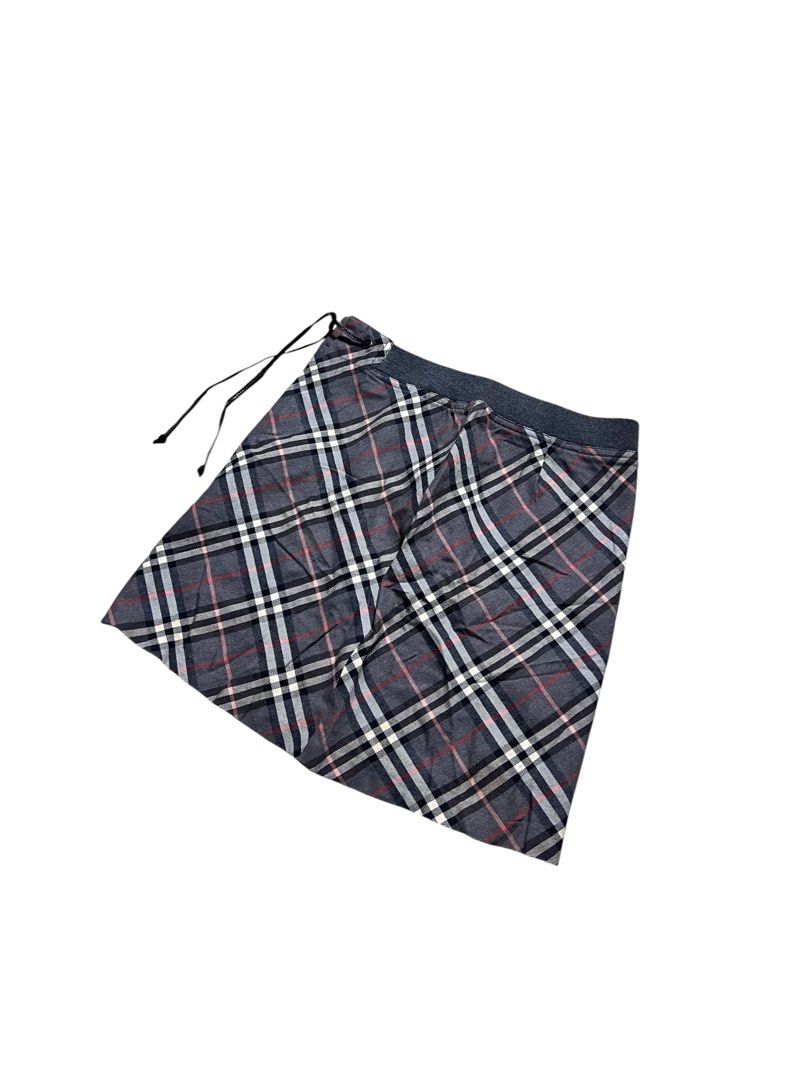 BURBERRY BLUE LABEL PLAID SKIRT (Category: Skirts) located in Las Pinas. Submitted by greedythrifterz (Listing ID 1460558170, Image 3). Description: BURBERRY BLUE LABEL PLAID SKIRT DIMES- WIDTH 28-30, LENGTH 16.5 (ALL INCHES) ISSUE- WASHABLE STAIN, NOT SO VISIBLE (CHECK PICS) FREESHIP AND NEGOTIABLE .