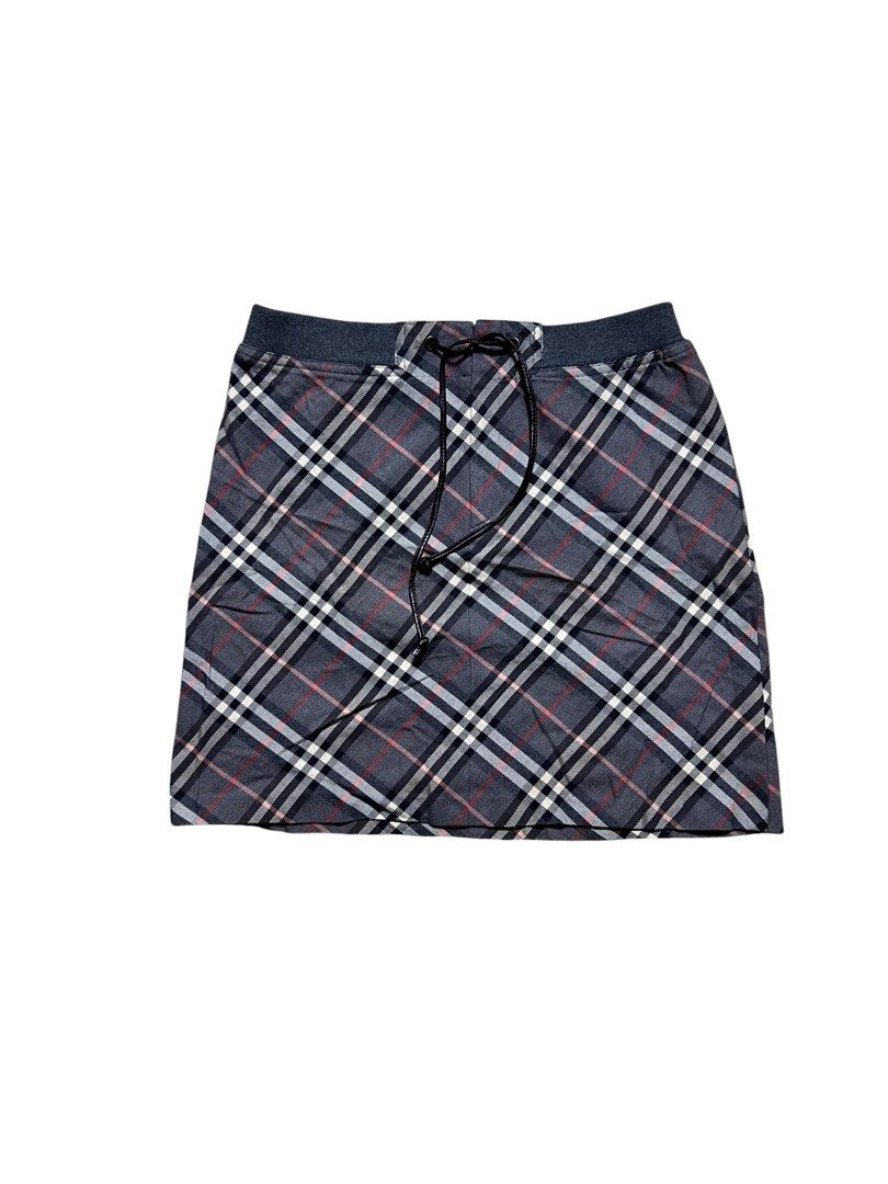 BURBERRY BLUE LABEL PLAID SKIRT (Category: Skirts) located in Las Pinas. Submitted by greedythrifterz (Listing ID 1460558170, Image 1). Description: BURBERRY BLUE LABEL PLAID SKIRT DIMES- WIDTH 28-30, LENGTH 16.5 (ALL INCHES) ISSUE- WASHABLE STAIN, NOT SO VISIBLE (CHECK PICS) FREESHIP AND NEGOTIABLE .