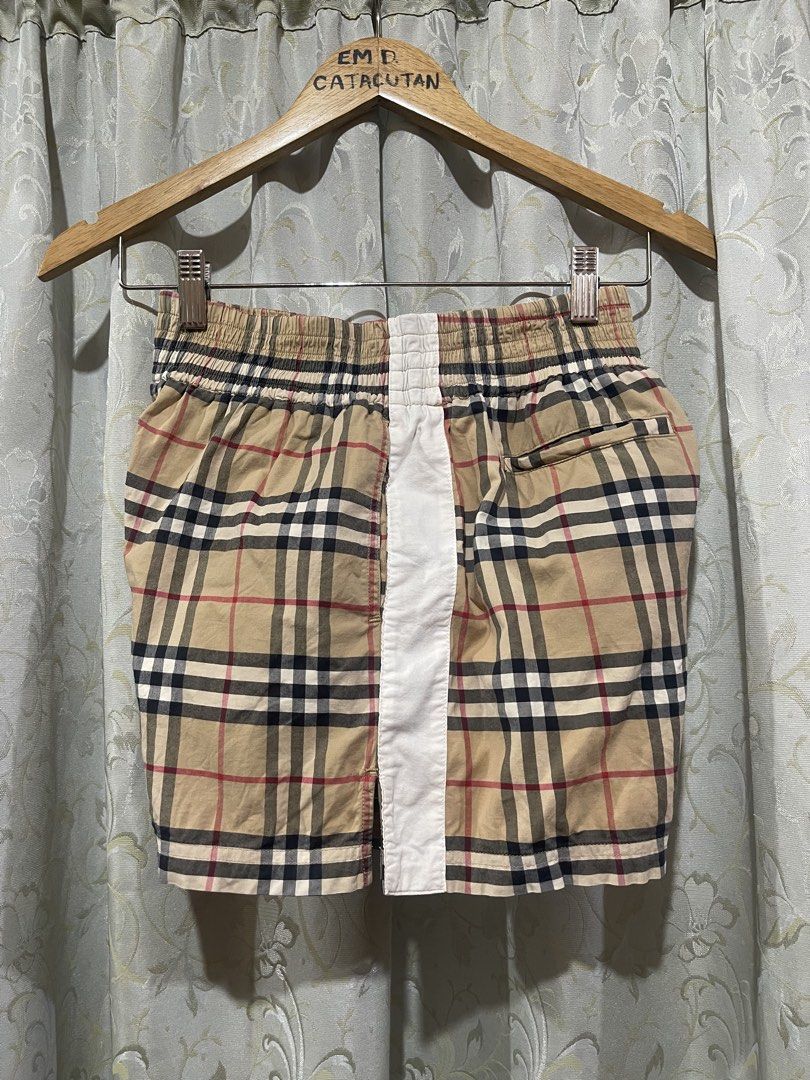Burberry Nova Check Shorts (Category: Shorts) located in Iligan City. Submitted by goldielooks143 (Listing ID 1460662571, Image 2). Description: - Classic Burberry nova check pattern - Comfortable elastic waistband - Convenient side pockets - Stylish white stripe detail on sides and back - Ideal for everyday casual wear - actual measurement can fit 24” up to 28” waistline, 14” length.
