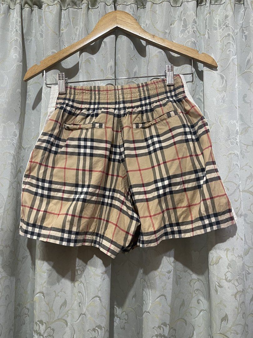 Burberry Nova Check Shorts (Category: Shorts) located in Iligan City. Submitted by goldielooks143 (Listing ID 1460662571, Image 3). Description: - Classic Burberry nova check pattern - Comfortable elastic waistband - Convenient side pockets - Stylish white stripe detail on sides and back - Ideal for everyday casual wear - actual measurement can fit 24” up to 28” waistline, 14” length.