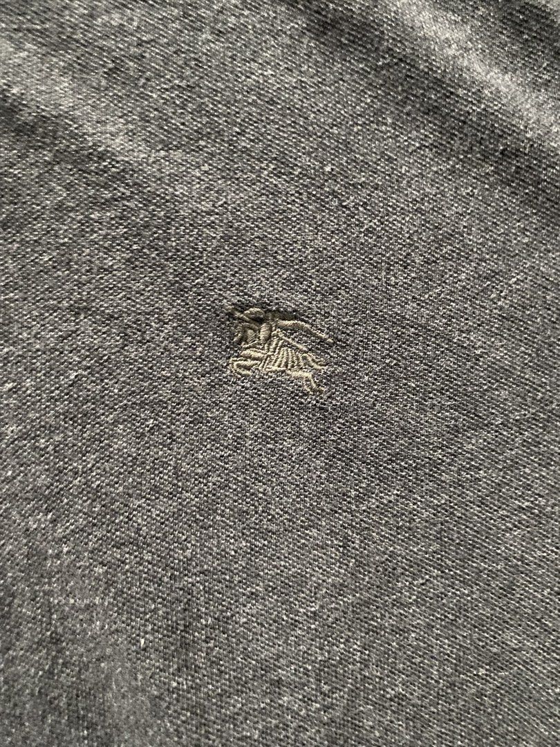 Burberry Polo Shirt (Category: Tshirts & Polo Shirts ) located in Ozamiz City. Submitted by thriftnikael (Listing ID 1460683878, Image 3). Description: width: 22.5 length: 28 size: xl on tag Color rate: 10/10 Condition: 10/10 Issue: n/a.