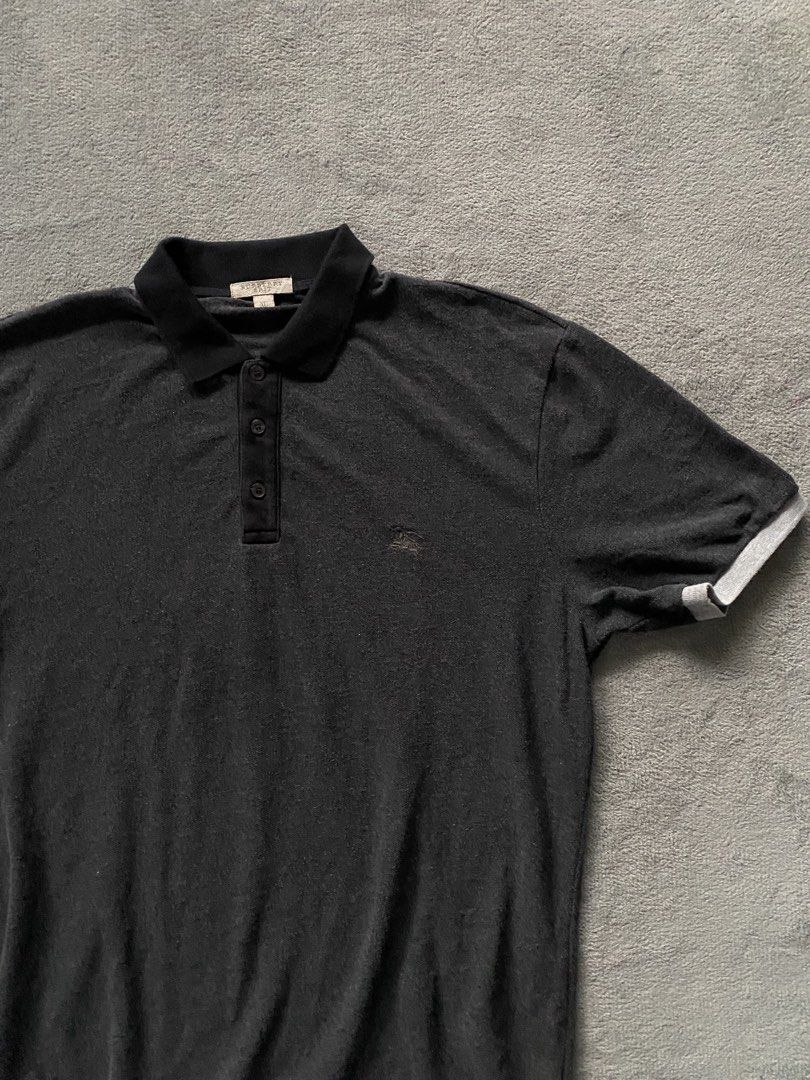 Burberry Polo Shirt (Category: Tshirts & Polo Shirts ) located in Ozamiz City. Submitted by thriftnikael (Listing ID 1460683878, Image 2). Description: width: 22.5 length: 28 size: xl on tag Color rate: 10/10 Condition: 10/10 Issue: n/a.