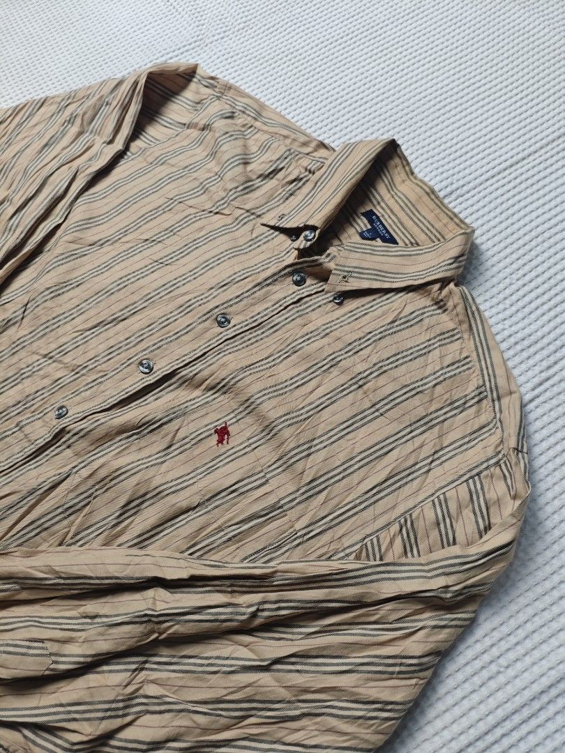 Burberry Stripes Longsleeves (Category: Formal Shirts) located in Dapitan. Submitted by vincesabejon (Listing ID 1460523961, Image 2). Description: Burberry Long sleeves Large on tag 23" Width 31" Length Excellent Condition No issue both Sobrang ganda po nito! Need wash Php:📥📥📥 Loc: Mindanao Unli vouch and vc for safety!.