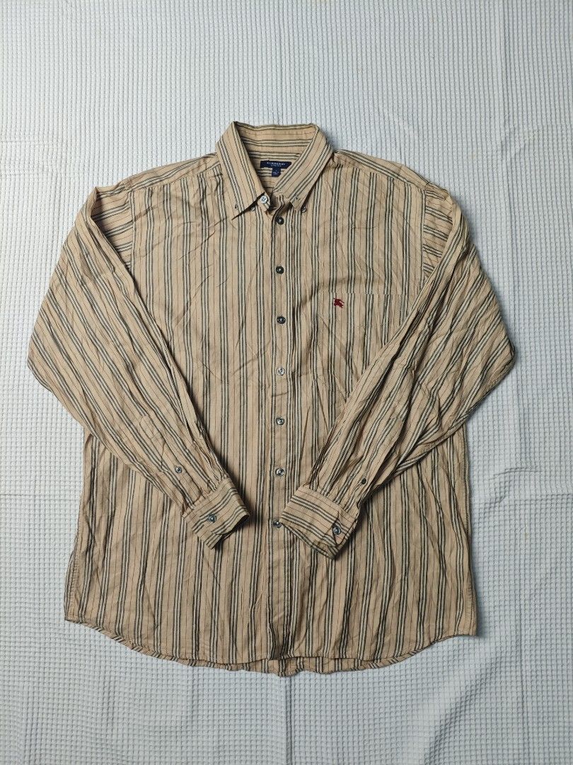 Burberry Stripes Longsleeves (Category: Formal Shirts) located in Dapitan. Submitted by vincesabejon (Listing ID 1460523961, Image 1). Description: Burberry Long sleeves Large on tag 23" Width 31" Length Excellent Condition No issue both Sobrang ganda po nito! Need wash Php:📥📥📥 Loc: Mindanao Unli vouch and vc for safety!.