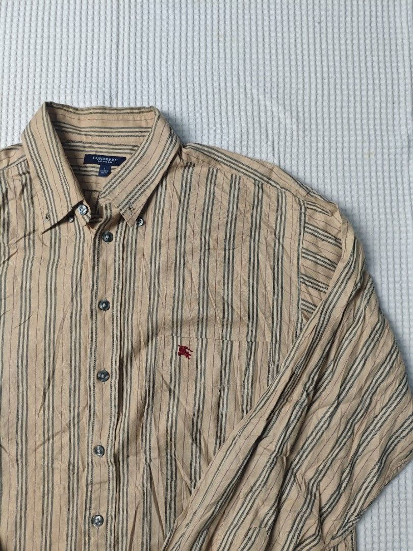 Burberry Stripes Longsleeves (Category: Formal Shirts) located in Dapitan. Submitted by vincesabejon (Listing ID 1460523961, Image 3). Description: Burberry Long sleeves Large on tag 23" Width 31" Length Excellent Condition No issue both Sobrang ganda po nito! Need wash Php:📥📥📥 Loc: Mindanao Unli vouch and vc for safety!.
