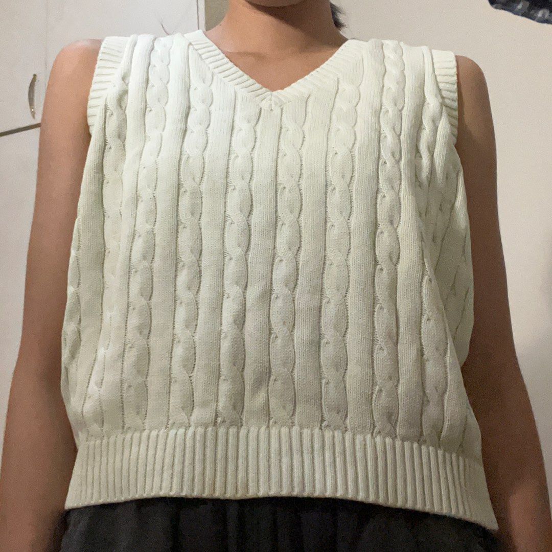 Cable Knit V-Neck Sweater Vest (Category: Sleeveless) located in Marikina City. Submitted by preloved.mana (Listing ID 1460182002, Image 2). Description: - cable knit sweater vest - size small MOP: gcash, maya MOD: jnt, lalamove LOC: marikina.