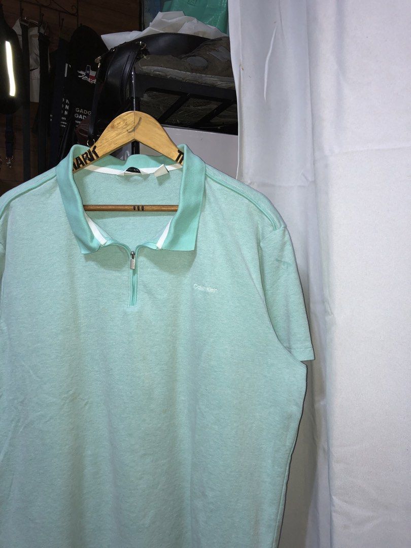 CALVIN KLEIN POLO SHIRT BIG SIZE (Category: Activewear) located in Manila. Submitted by triptothrift7 (Listing ID 1460674789, Image 2). Description: pm me for fast transaction! CALV1N KLEIN POLO SHIRT BIG SIZE for only 580 size 2XL width 26 x 27 length need wash only no issue authentic legit excellent condition color rate 9/10 authentic legit mode of payment gcash or bank transfer location Biñan laguna.