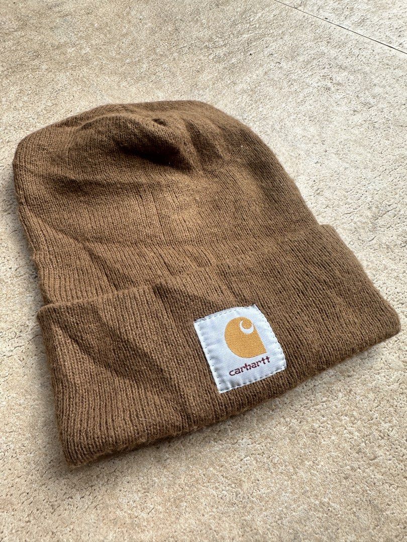 Carhartt Brown Acrylic Beanie Hat (Category: Caps & Hats) located in Manila. Submitted by collect__ph (Listing ID 1460559818, Image 2). Description: - Classic Carhartt beanie in a versatile brown color. - Made from 100% acrylic for excellent warmth and comfort. - Simple, durable design built to last. - Perfect for everyday wear during cooler seasons. - Effortlessly stylish and easy to pair with any outfit..