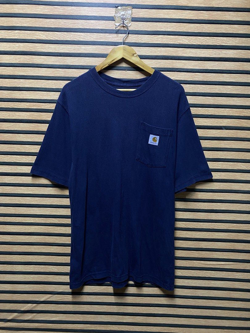 CARHARTT K-87 “Pocket Tee” (Category: Tshirts & Polo Shirts ) located in Makati City. Submitted by drip.poww (Listing ID 1460521795, Image 1). Description: - Authentic Carhartt - Color: Navy Blue - Size: Meduim on tag - Dimes: 22x30 - Authentic - Excellent condition - Need wash, fresh from bale - Material: 100% Cotton Please don’t expect too much—these are thrifted (ukay) items. 😊 !!STILL NEGOTIABLE!!.
