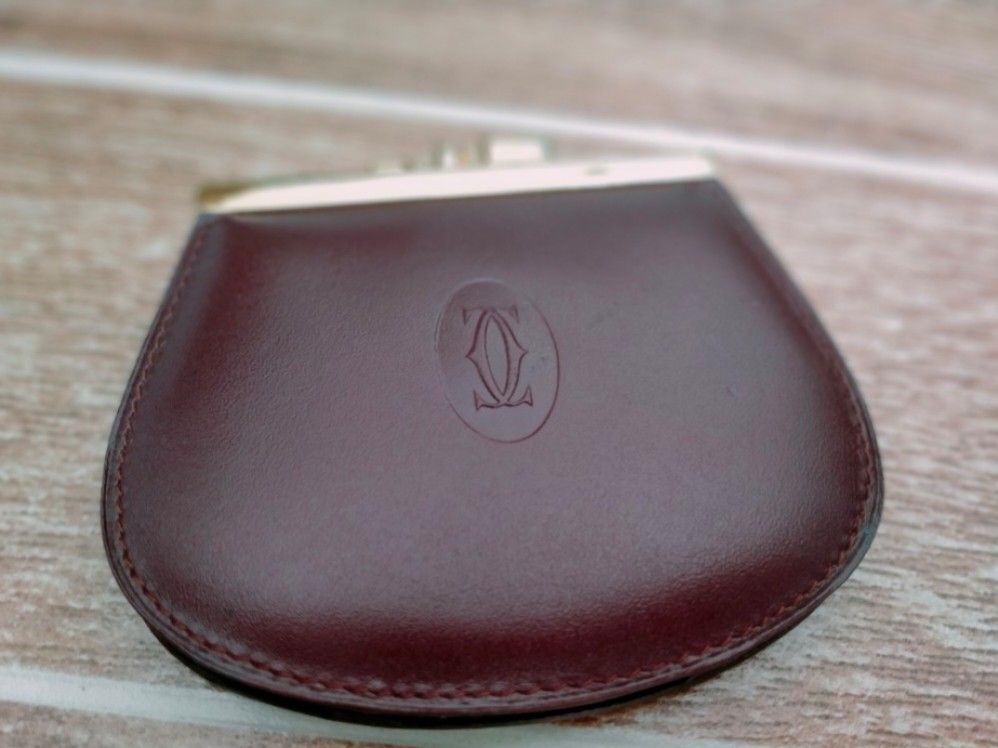CARTIER COIN PURSE (Category: Luxury Bags & Wallets) located in Cabuyao City. Submitted by Bike_Clothing10 (Listing ID 1460508584, Image 1). Description: READ FIRST.... FOR SALE: CARTIER COIN PURSE Good Condition With light scratches sa gold plated part NOTE: With slight issue (see attached pic) di naman kita, nasa loob. PRICE: 3500 + SF -NO COD/COP- PICK UP OR SHIPPING ONLY LOC: Cabuyao Laguna PM FOR INQUIRIES -Thanks-.