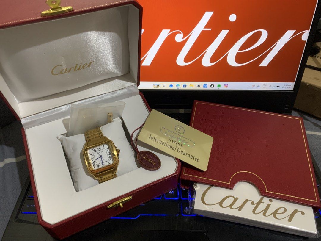 Cartier Santos Galbee Automatic Gold Watch (Category: Luxury Watches) located in Dasmarinas. Submitted by prerogathrift (Listing ID 1460713986, Image 1). Description: -mid tier watch - Cartier Santos Galbee Automatic Watch - Luxurious Gold Casing - Classic Roman Numeral Dial - Signature Blue Hands - Comes with Box - Includes International Guarantee Card .