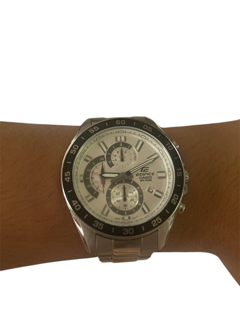 Casio Edifice Chronograph Watch (Category: Men's Watches) located in Marilao. Submitted by ignacioyur63022 (Listing ID 1460513809, Image 2). Description: Casio Edifice watch with chronograph function. Silver stainless steel band and case. White dial with Roman numerals and sub-dials. Water resistant 100m. Includes original box, manual, and extra links. Great for everyday wear or special occasions..