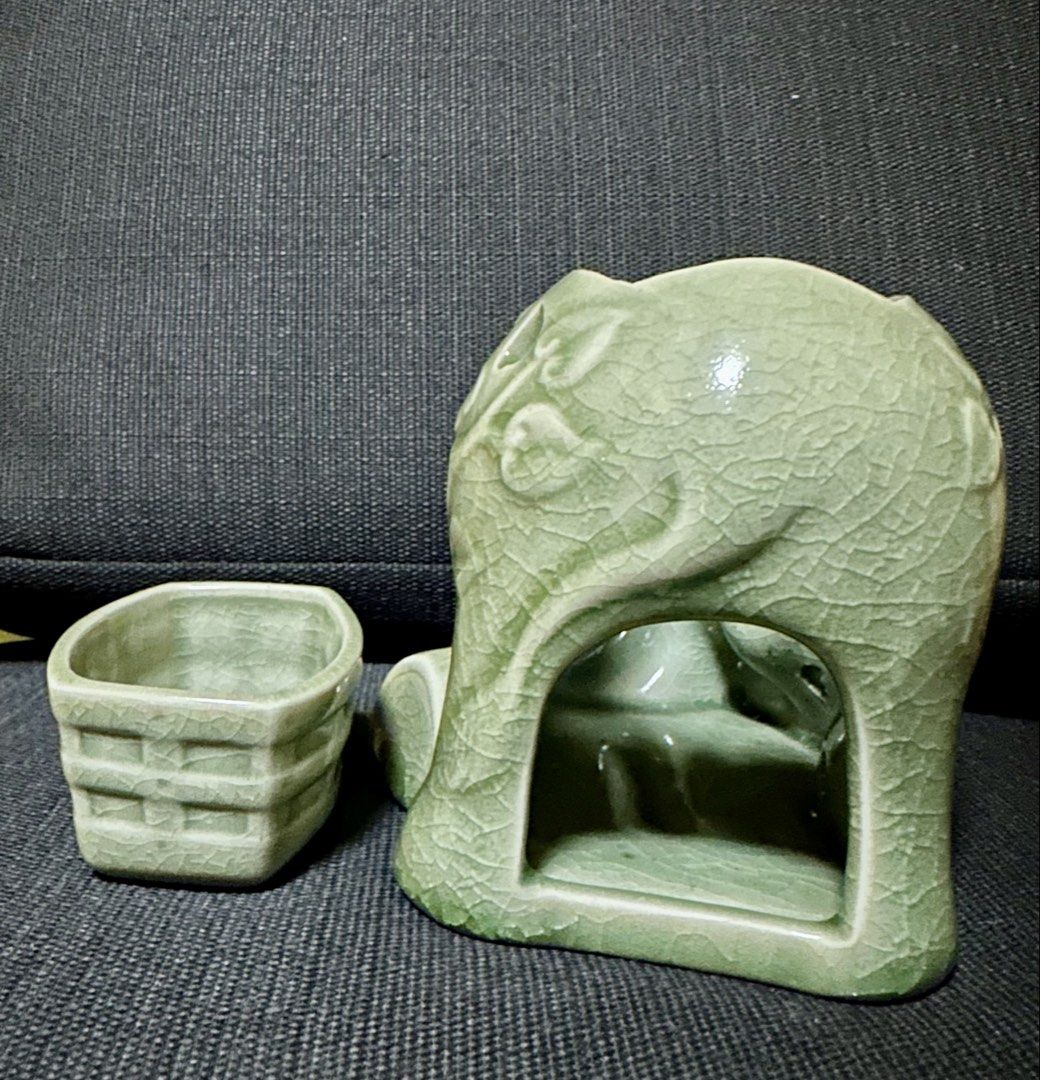 Ceramic Light Green Ceramic Elephant Essential Oil Diffuser, Aromatherapy Burner (Category: Other Home Decor) located in Quezon City. Submitted by shopaholic.kart2021 (Listing ID 1460656034, Image 2). Description: -Decorative ceramic oil burner in a light green color with elephant design. -Place the aromatic oil of your choice on top and a tea light on the bottom. With the temperature the oil will release its aroma and it will spread in the space