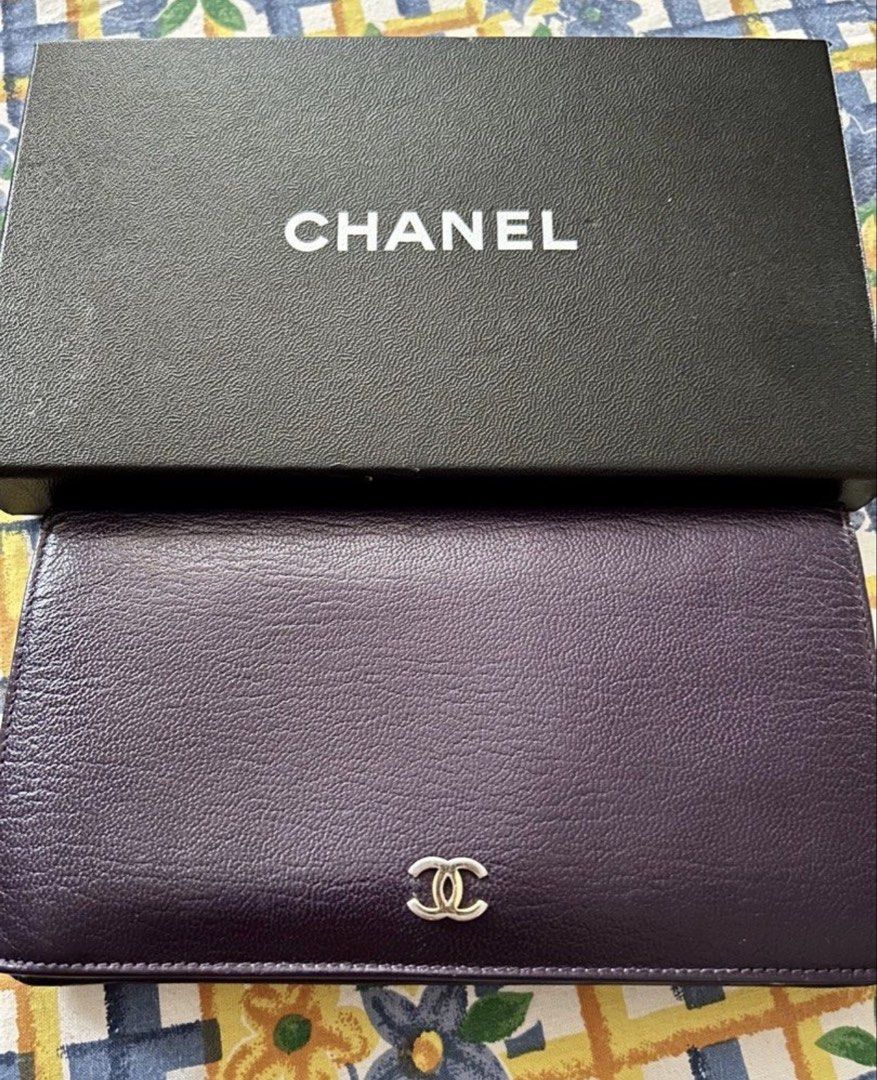 Chanel Long Wallet Purple Caviar Leather (Category: Luxury Bags & Wallets) located in Quezon City. Submitted by asiaco (Listing ID 1460561803, Image 1). Description: Authentic purple Chanel caviar leather long wallet. Includes original box and authenticity card. Features multiple card slots, compartments, and zipper closure. Serial number 7177391..