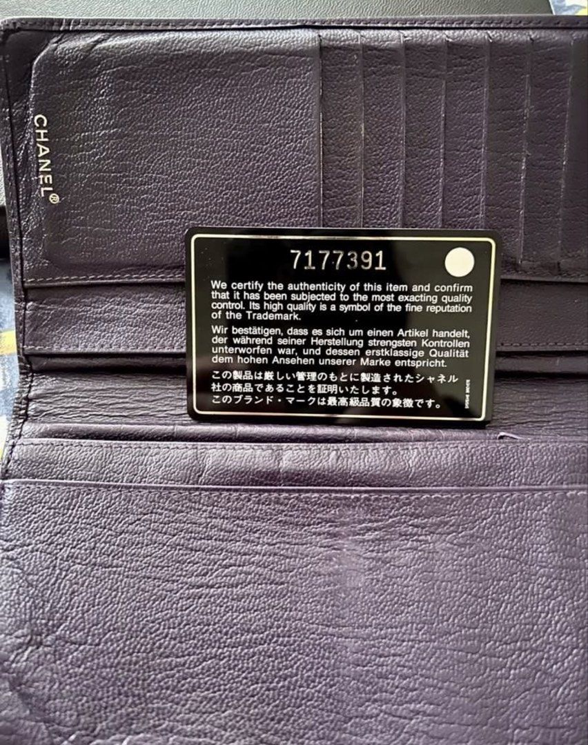 Chanel Long Wallet Purple Caviar Leather (Category: Luxury Bags & Wallets) located in Quezon City. Submitted by asiaco (Listing ID 1460561803, Image 2). Description: Authentic purple Chanel caviar leather long wallet. Includes original box and authenticity card. Features multiple card slots, compartments, and zipper closure. Serial number 7177391..