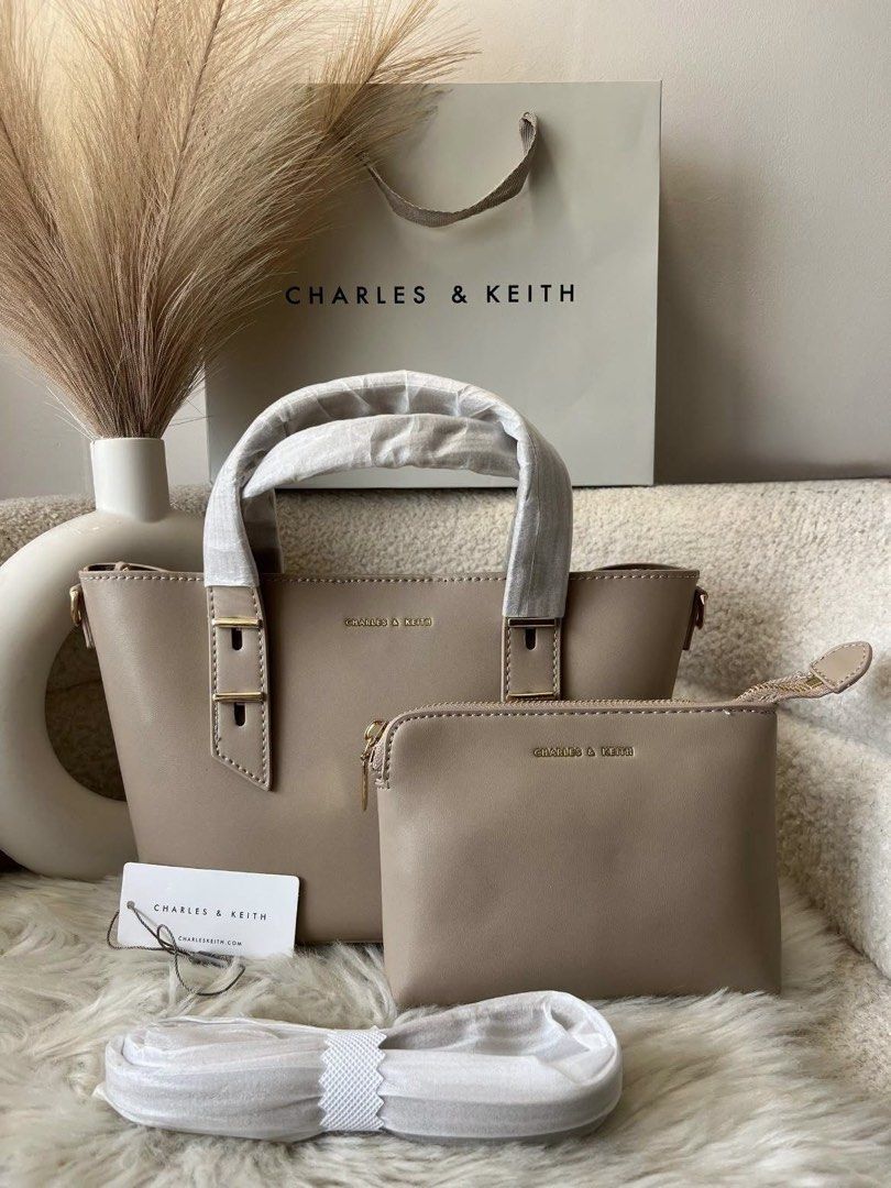 Charles & Keith Hand & Sling Bag with Pouch (Category: Shoulder Bags) located in Pasig City. Submitted by preloved.closet2 (Listing ID 1460703509, Image 1). Description: Color Beige With pouch With sling Add paperbag plus 80 .