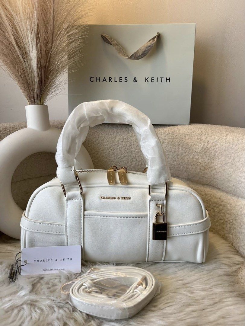 Charles & Keith Scottie Bowling Bag - White (Category: Cross-body Bags) located in Pasig City. Submitted by preloved.closet2 (Listing ID 1460704619, Image 1). Description: Fixed price With Sling Color Off white Add paperbag plus 80 .