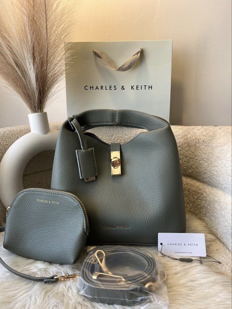Charles & Keith Turn lock Bag with pouch - Green (Category: Shoulder Bags) located in Pasig City. Submitted by preloved.closet2 (Listing ID 1460638221, Image 1). Description: With pouch With sling Add paperbag plus 80 .