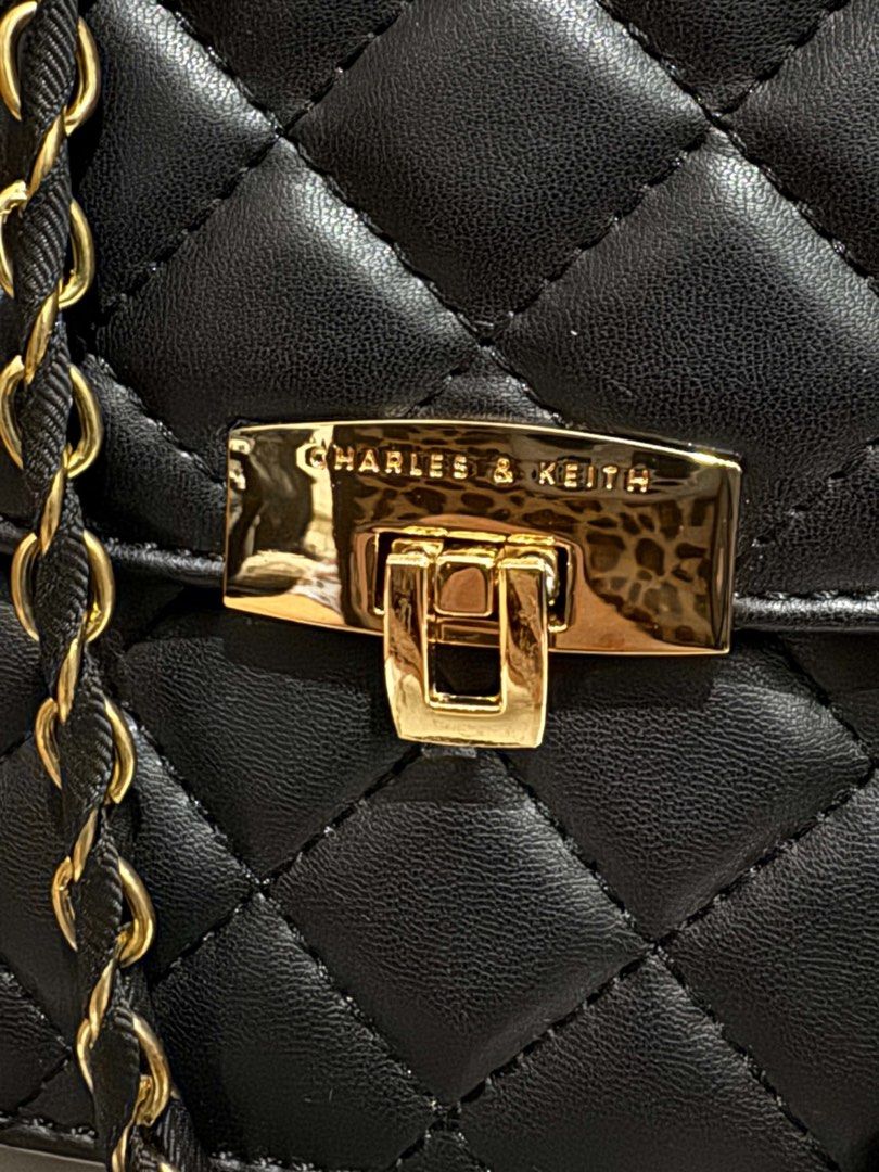 Charles and Keith Chain-Strap Shoulder Flap Bag Black (Category: Shoulder Bags) located in Manila. Submitted by kawfeechino (Listing ID 1460555702, Image 3). Description: Charles and Keith Chain-Strap Shoulder Flap Bag Black ₱1,800 one-time used with flaws ✨.