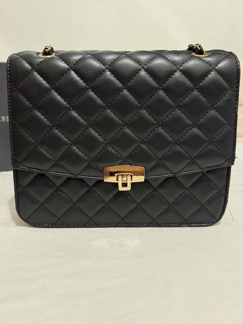 Charles and Keith Chain-Strap Shoulder Flap Bag Black (Category: Shoulder Bags) located in Manila. Submitted by kawfeechino (Listing ID 1460555702, Image 2). Description: Charles and Keith Chain-Strap Shoulder Flap Bag Black ₱1,800 one-time used with flaws ✨.