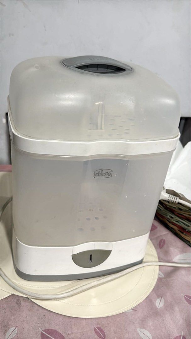 Chicco Bottle Sterilizer (Category: Breastfeeding & Bottle Feeding) located in Valenzuela. Submitted by eiram91 (Listing ID 1460548924, Image 1). Description: - Chicco Electric Steam Sterilizer - Keeps bottles, nipples, and pacifiers clean - Simple operation: add water, press button - Sterilizes quickly in minutes - Ideal for busy parents - Promotes baby's health.