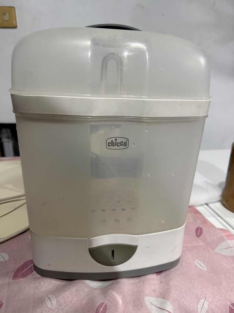 Chicco Bottle Sterilizer (Category: Breastfeeding & Bottle Feeding) located in Valenzuela. Submitted by eiram91 (Listing ID 1460548924, Image 2). Description: - Chicco Electric Steam Sterilizer - Keeps bottles, nipples, and pacifiers clean - Simple operation: add water, press button - Sterilizes quickly in minutes - Ideal for busy parents - Promotes baby's health.
