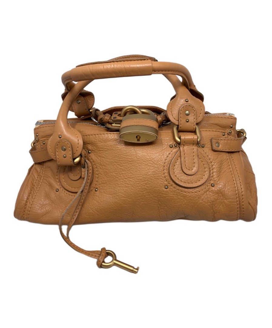 Chloe Paddington Medium Brown Tan (Category: Luxury Bags & Wallets) located in Las Pinas. Submitted by daisuki_japan_luxury_by_reiko (Listing ID 1460516803, Image 1). Description: Item Name Chloe Paddington handbag color brown situation This item is pre-owned and may have minor scratches and stains due to use. Because it is displayed and sold in our store, there may be minor scratches and stains not mentioned in the description. Pockets and stora