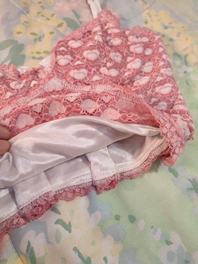 CIDER Pink Heart Lace Top (Category: Sleeveless) located in Jaen. Submitted by roxantiago (Listing ID 1460535048, Image 3). Description: - Cute pink lace crop top - Adorable heart pattern - Adjustable straps for a perfect fit - Lined bust for comfort and support - Delicate lace trim at the hem - Sweet yet edgy vibe - Versatile for nights out or elevating everyday outfits temporarily adjusted to Small. original size can fit M to L has runs sa stra