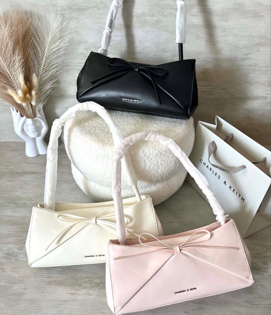 C&K Hazel Bow Panelled Shoulder Bag (Category: Shoulder Bags) located in Bulacan. Submitted by mykakarizza (Listing ID 1460590571, Image 1). Description: NEW✨✨ ₱800 onlyyy C&K Hazel Bow Panelled Shoulder Bag Width 27 cm Depth 7 cm Height 13 cm Add paperbag 100 📸 Actual pics! 🙋🏻‍♀️ ─── ✦ ─── ✦ ─── ✦ ─── ✦ ─── 🛍️ LOOKING FOR MORE RESELLERS 🛍️ ✨ Buy 3 pcs of ANY items — FREE SHIPPING NA!🚚 ✨ Buy 10 items → FREE SF + ₱50 OFF EACH! 💖 PM us for 3